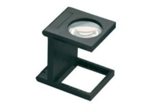 Small circular magnifying lens set in a black plastic casing, above a rectangular base. 