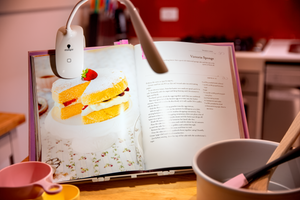 Smart Clip-on lamp being used for reading a recipe book