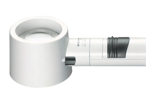 White, circular magnifier attached to battery handle