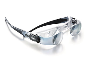 Heavy duty plastic frame with double lens magnifying system. Black frame with black adjusting cogs on temples, and clear lens casing.