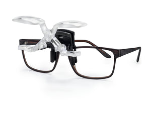 MaxDETAIL, double-lens magnifying system clip on for spectacle wearers, shown with frame and system raised.