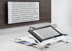 Visolux Digital HD being used to project a book onto a television 