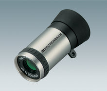 Load image into Gallery viewer, Silver cylindrical monocular with black eye-piece and Eschenbach logo printed onto silver housing, and black grip ring.
