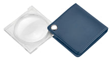 Load image into Gallery viewer, Circular magnifier with clear square housing, attached to blue square case.
