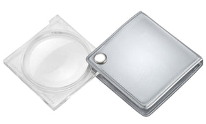 Circular magnifier with clear square housing, attached to silver square casing.