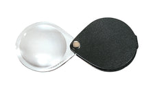 Load image into Gallery viewer, Circular magnifier inside clear oval setting, with attached fold-out black case
