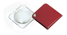 Load image into Gallery viewer, Circular magnifier inside clear square setting, with attached fold-out red case
