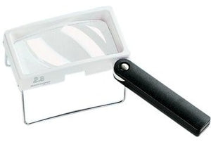 Rectangular magnifier with white housing, black handle and rectangular stand.